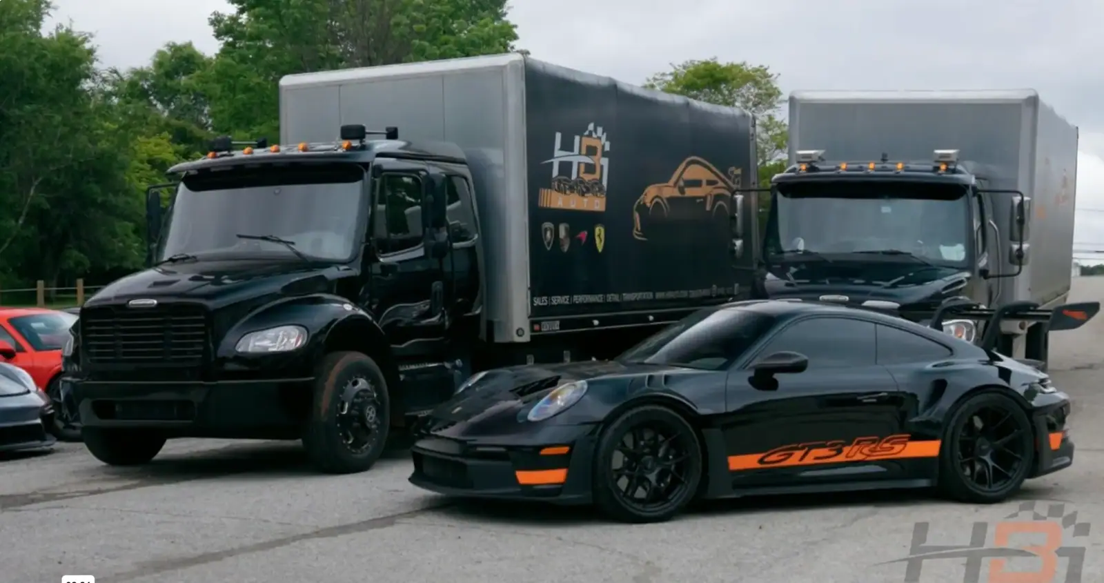 HBi enclosed trailer transporting a Porsche